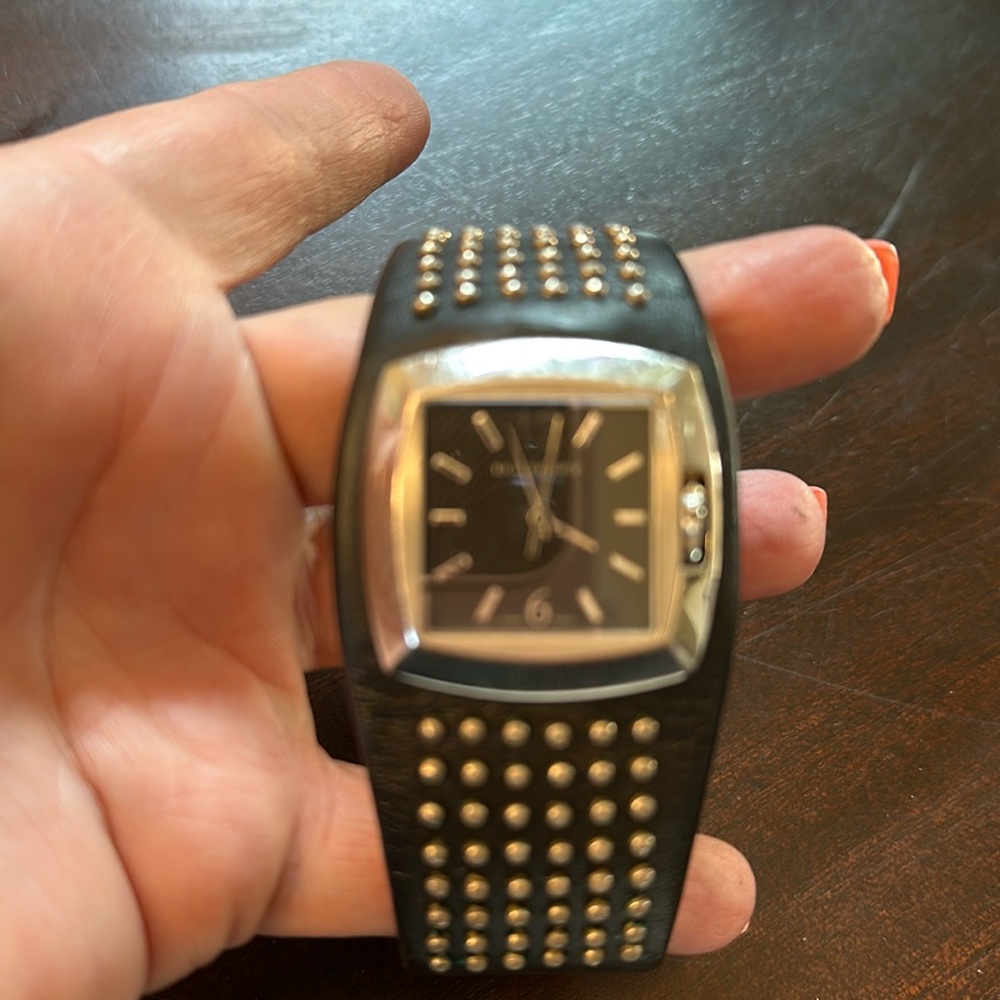 Authentic vintage Burberry watch in black leather with silver studs.